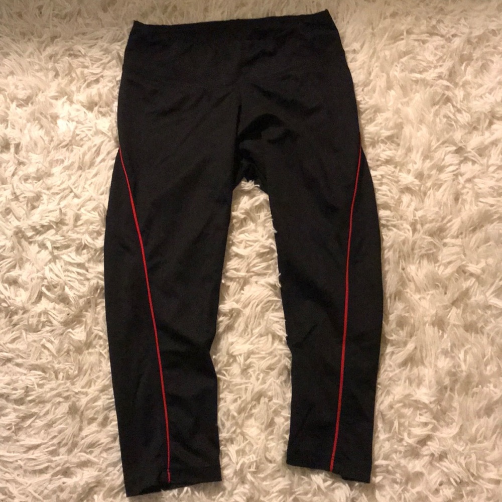 Black leggings with red stripe